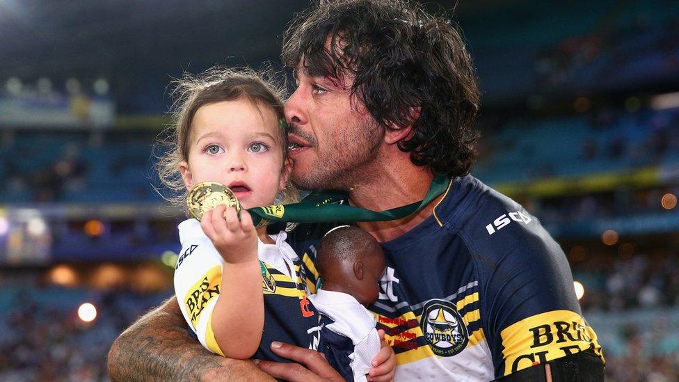 Cowboys captain Johnathan Thurston takes a moment in the centre of the field with his daughter Frankie Thurston at ANZ Stadium on 4 October 2015 in Sydney, Australia.