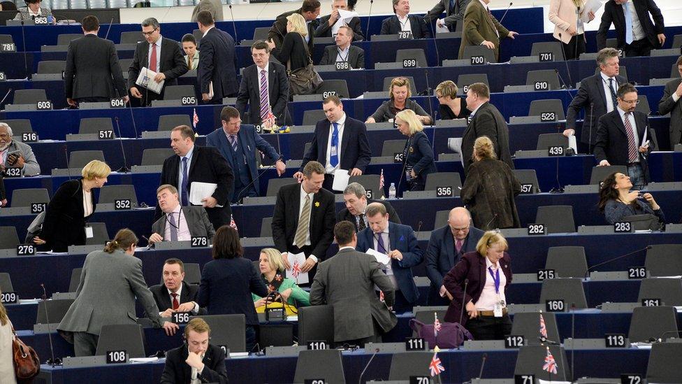 MEPs talking before a plenary sitting in Strasbourg