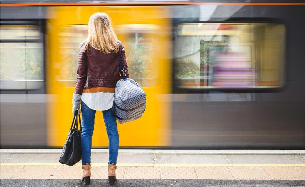 Woman on tube platform