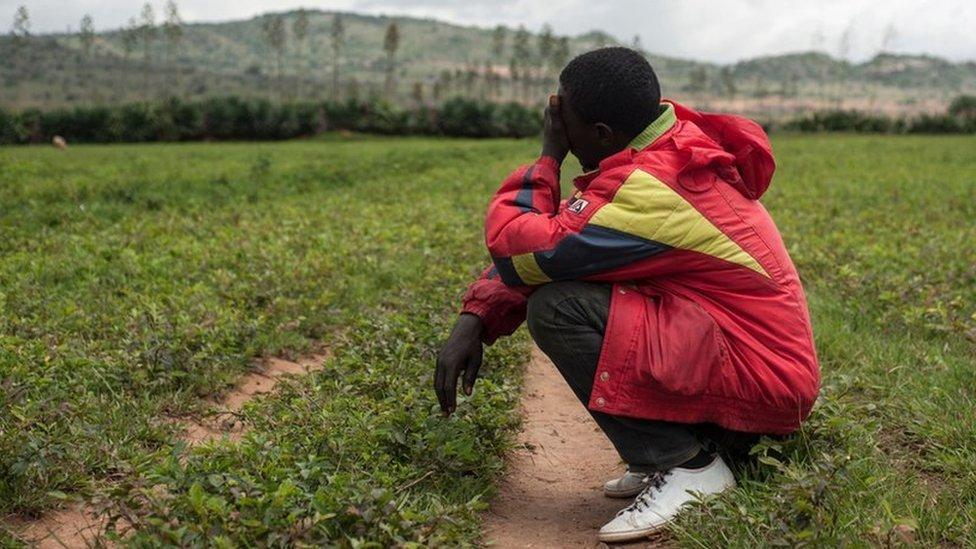 A man cries after losing his relatives on June 27, 2018, following an attack by Fulani herdsmen.