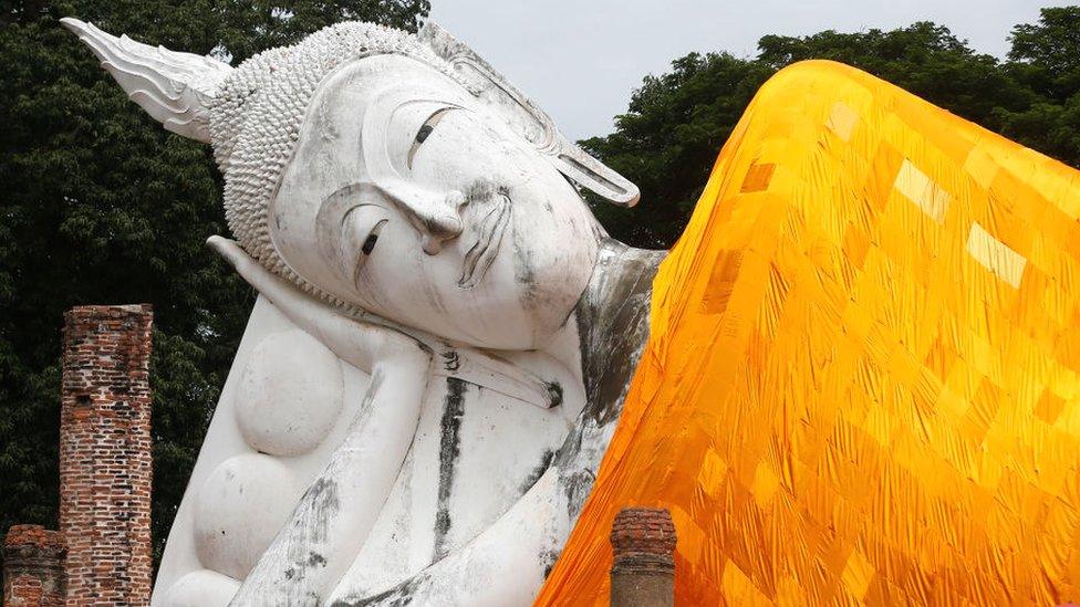 A reclining Buddha at Wat Khun-Intha Pramul in Ang Thong province, north of Bangkok