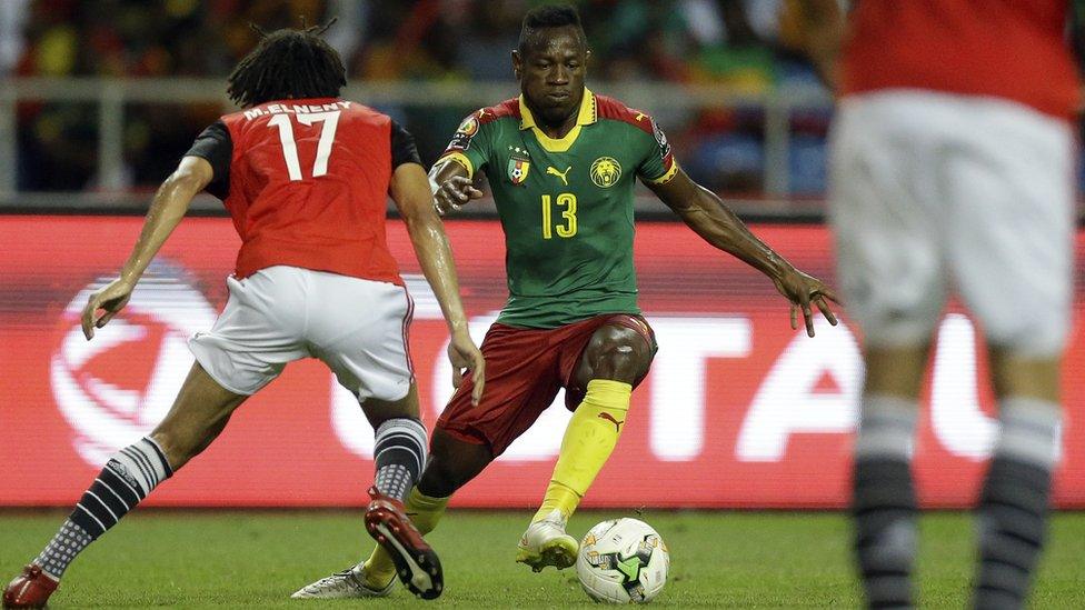 Christian Bassogog taken on Egyptian Mohammed Elneny