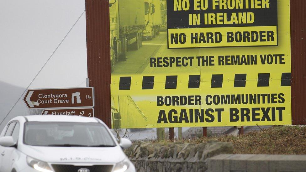 A motorist crosses over the border from the Irish Republic into Northern Ireland near the town of Jonesborough, Northern Ireland