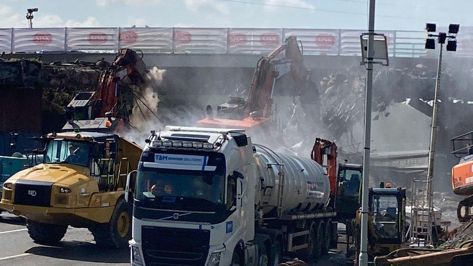 The central part of the bridge is brought down