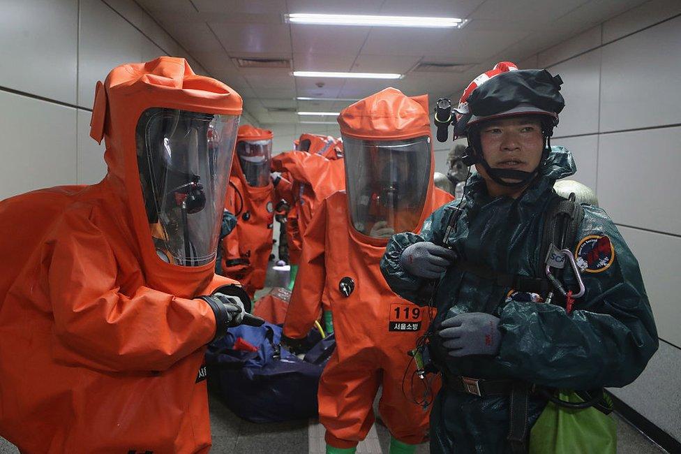 Emergency services personnel wearing protective clothing participate in an anti-terror and anti-chemical terror exercise as part of the 2016 Ulchi Freedom Guardian (UFG) at Yeoui subway station on August 23, 2016 in Seoul, South Korea.