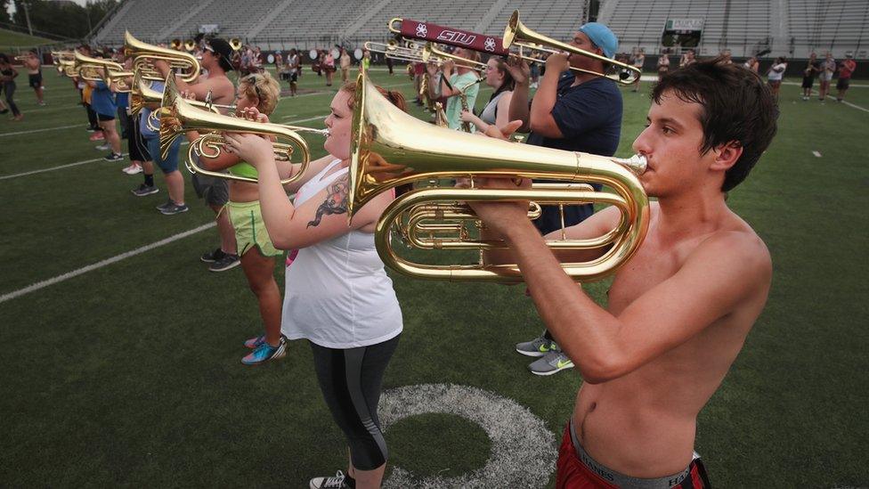 The student marching band practices on the campus of Southern Illinois University before participating in tomorrow's solar eclipse program being held at the campus football stadium on August 20, 2017 in Carbondale, Illinois. With approximately 2 minutes 40 seconds of totality the area in Southern Illinois will experience the longest duration of totality during the solar eclipse. Millions of people are expected to watch as the eclipse cuts a path of totality 70 miles wide across the United States from Oregon to South Carolina on August 21.