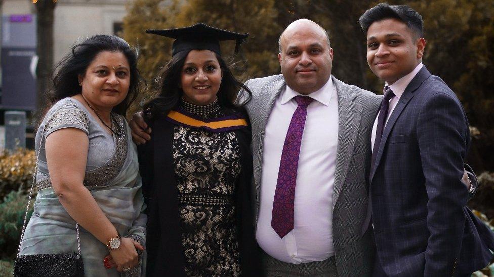 Raj Aggarwal with his wife and children