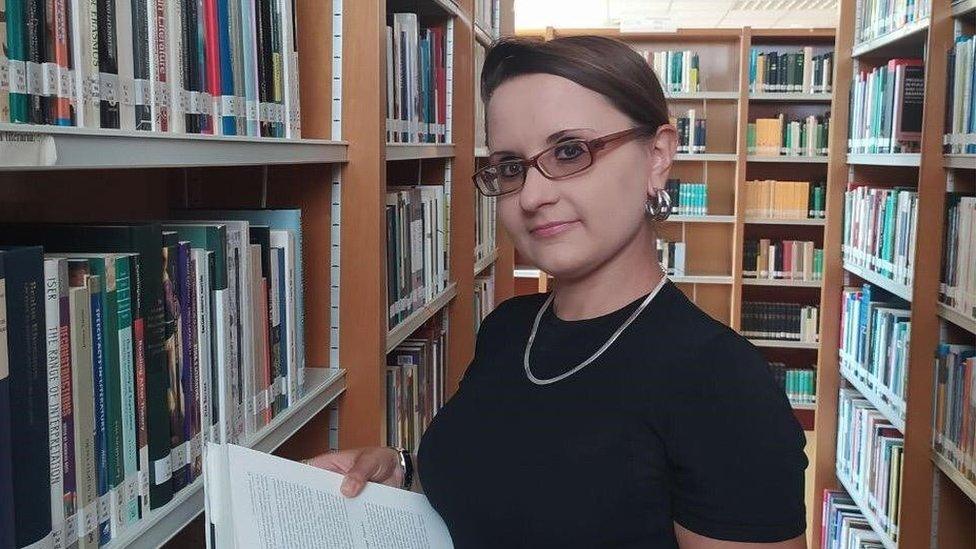 Yullia Lysanets in a library