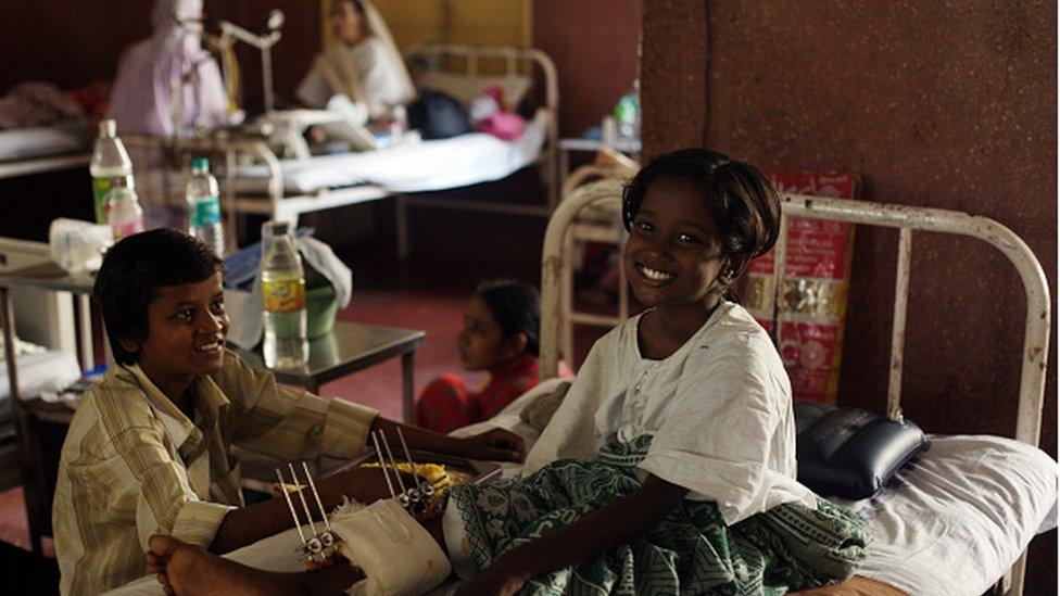 Devika Rotawan, 10year old girl, injured by bullet at CST terror attack, with his brother Akash at J J Hospital. (Photo by Manoj Patil/Hindustan Times via Getty Images)