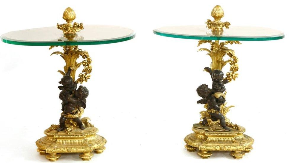 A pair of gilt bronze-mounted side tables