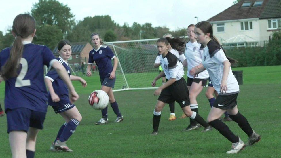 girls playing football