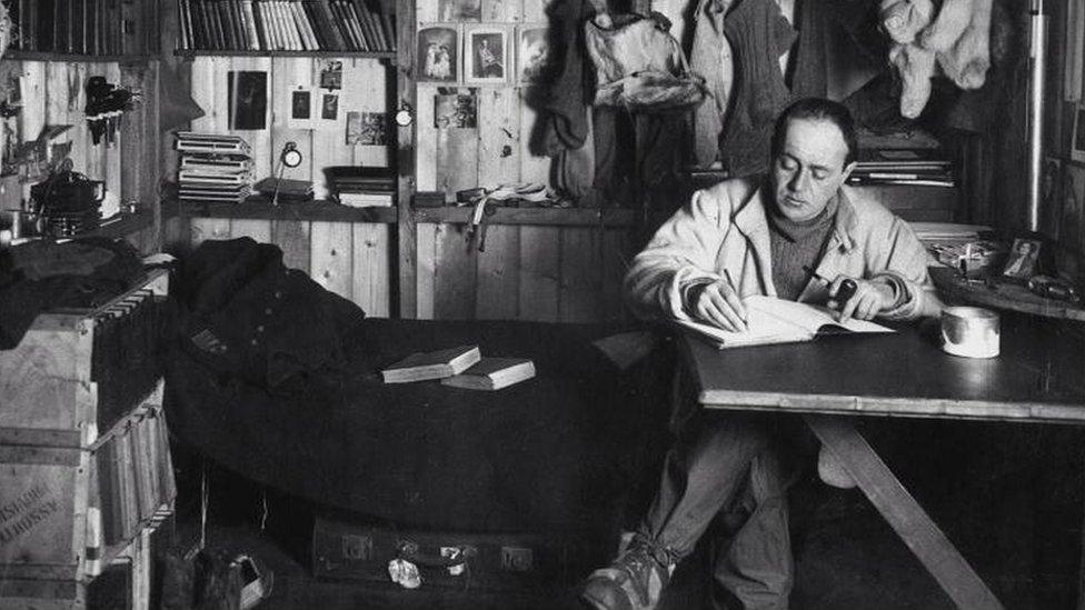 Captain Scott writing at the British base camp in Antarctica, 1911