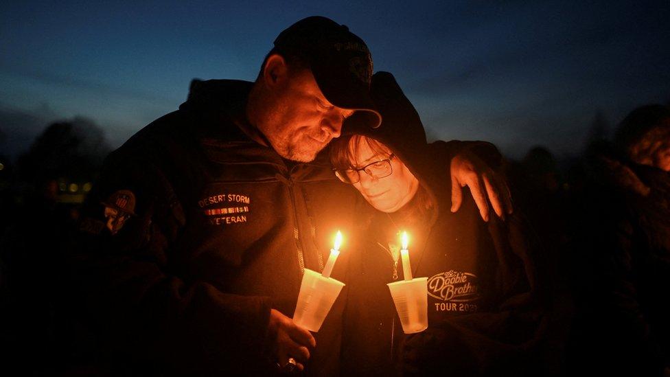 A couple old candles at a vigil