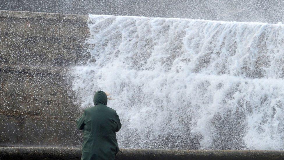 Waves over sea wall in Portrush