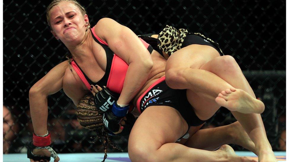 Paige VanZant fighting Felice Herrig.