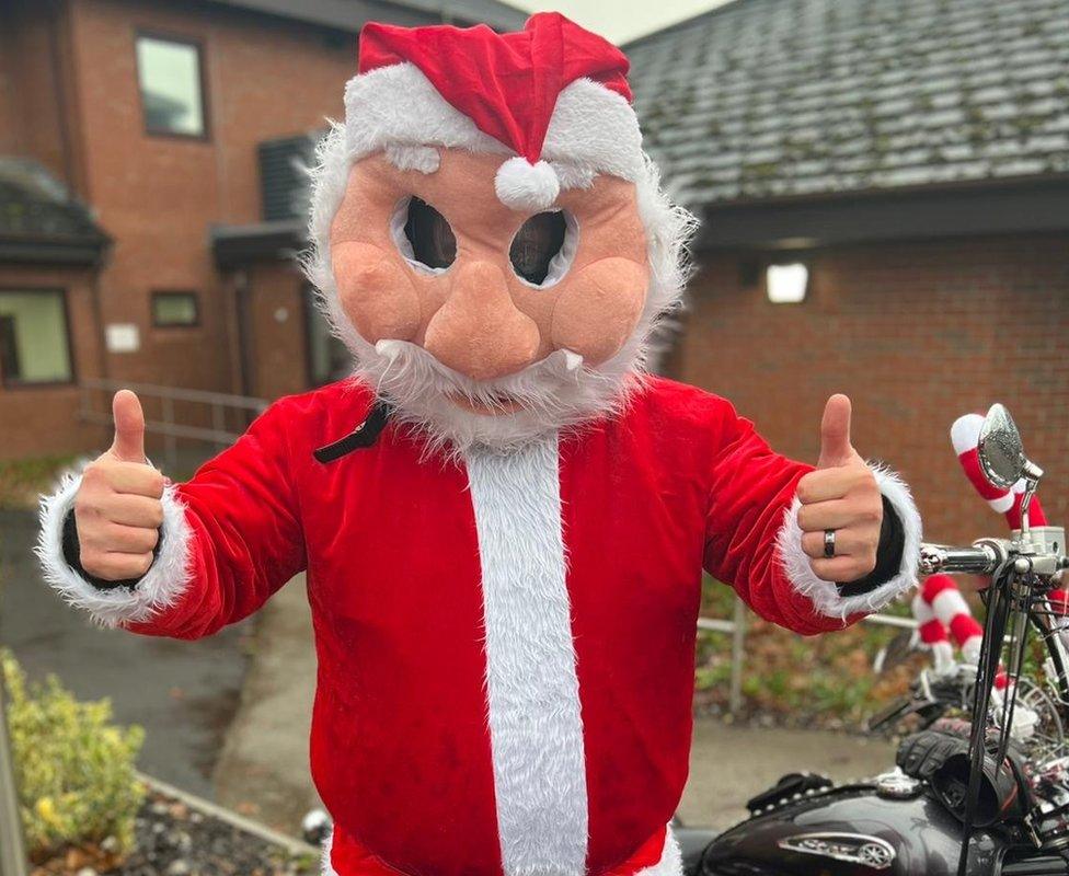 Soul Takers Motorcycle Club rider dressed as Santa