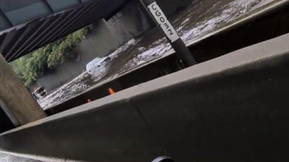 Screen grab from footage taken with permission from the Facebook page of Matt Hickmott of flash flooding on the M25, where it was also raining and hailing.