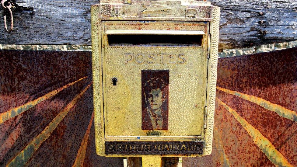 Over 120 years after Rimbaud's death, letters are still sent to this letter box in the cemetery where he is buried at Charleville-Mezieres