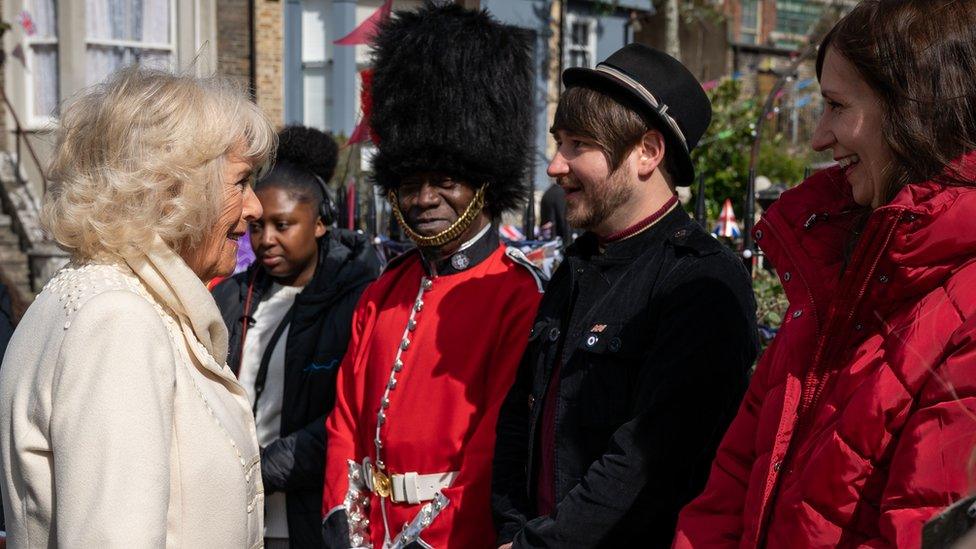 The Duchess of Cornwall with Ben Champniss during a visit to the set of EastEnders