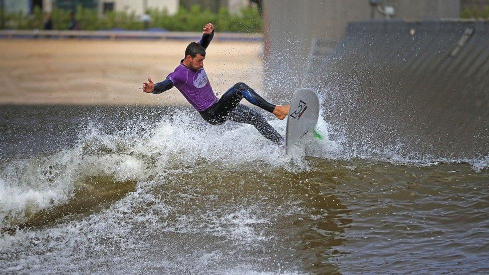 DOLGARROG, WALES - AUGUST 05: Senior Instructor Rick Velk rides a wave at Surf Snowdonia on August 5, 2016 in Dolgarrog, Wales. Surf Snowdonia is the world's first inland surf lagoon featuring pioneering technology which has made an Olympic dream a reality for British surfers. The International Olympic Committee (IOC) has announced its decision to include surfing in the Tokyo 2020 Olympics. The lagoon creates a perfect wave for surfers and was central to the inclusion of surfing in the Olympic Games. Surf Snowdonia will be crucial training facility for first ever surfing Team GB. (Photo by Christopher Furlong/Getty Images)