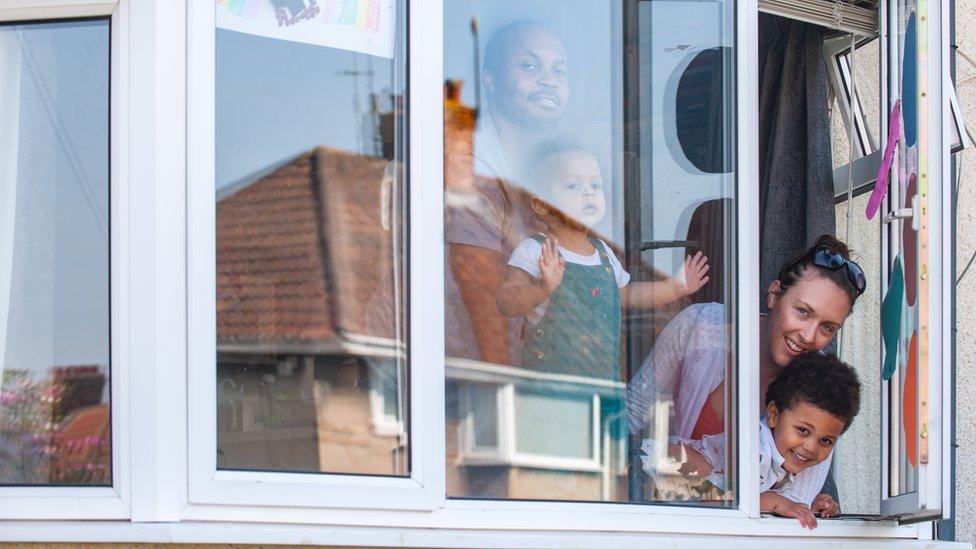 Jen and her family pictured in their house in Bristol