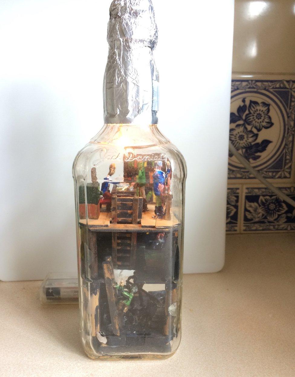 Coal miners in bottle