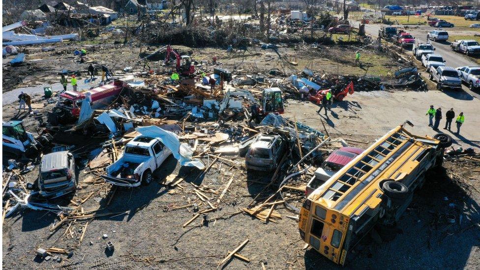 A school bus on its side