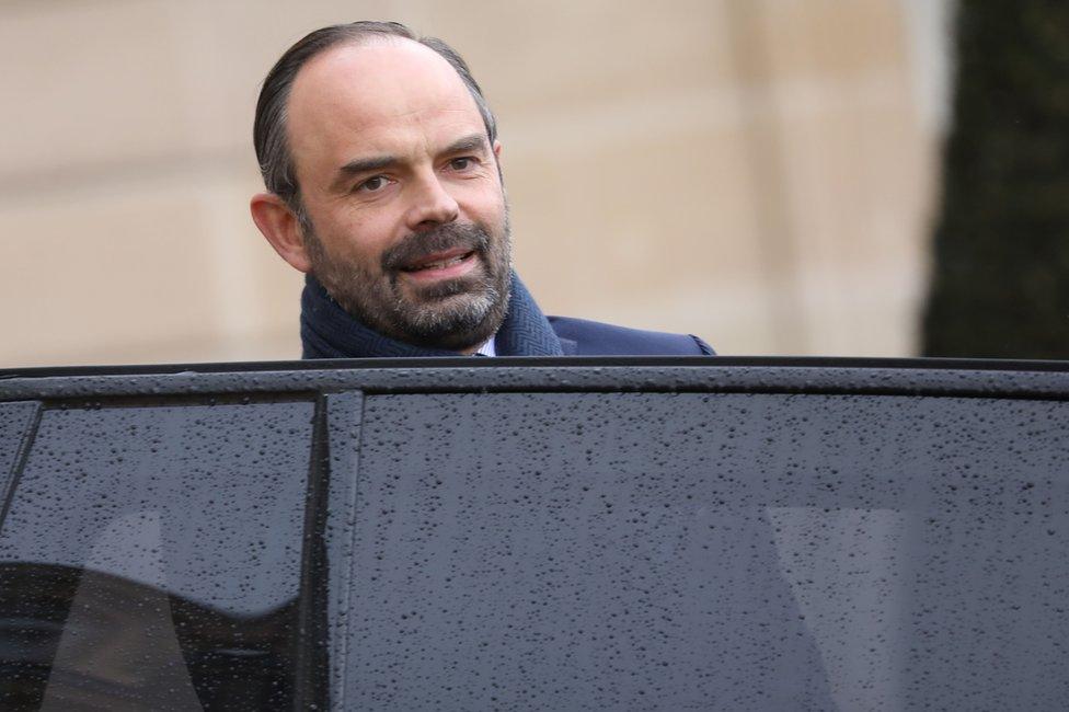 French Prime Minister Edouard Philippe leaves the Elysee Presidential Palace after attending a weekly cabinet meeting on 7 March 2018 in Paris