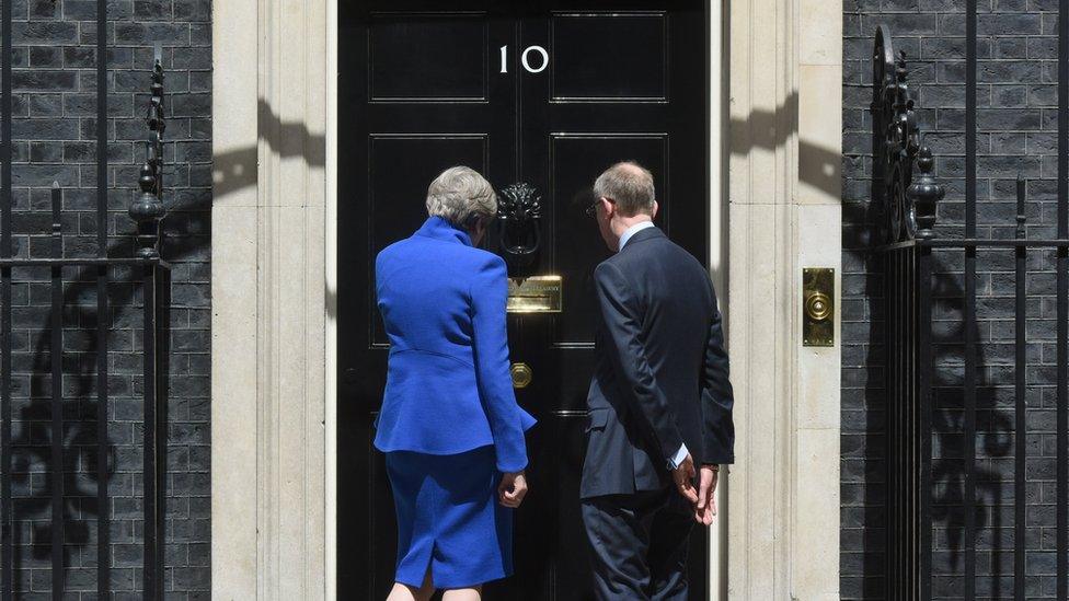 Theresa and Philip May on the steps of No 10