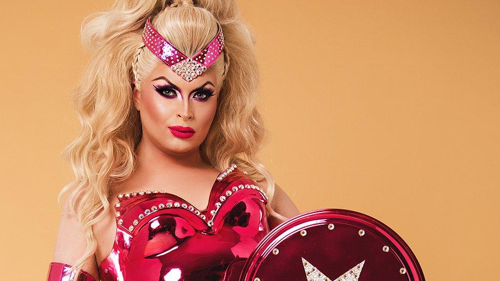 Cheryl Hole Drag in pink armour for Drag Race UK vs The World