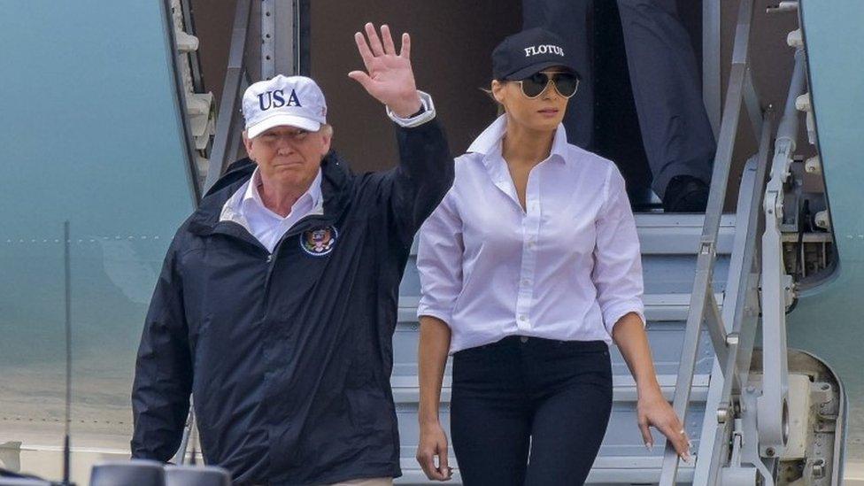 President Donald Trump waves next to First Lady Melania Trump upon arrival in Corpus Christi, Texas, 29 August 2017