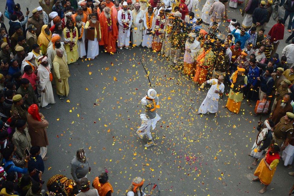 An Indian Sadhu performs during a religious procession for the upcoming Kumbh Mela festival in Allahabad on January 7, 2019.