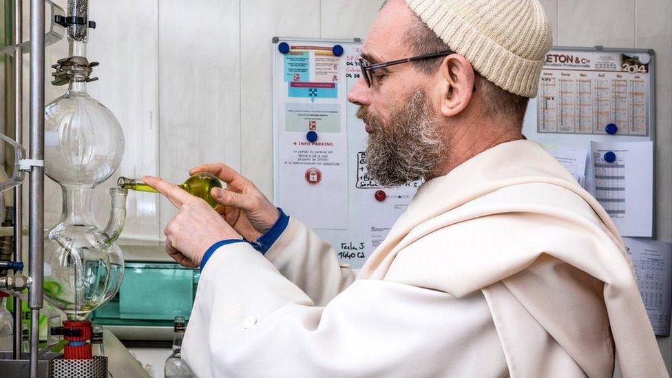 Monk checks on the distillation process