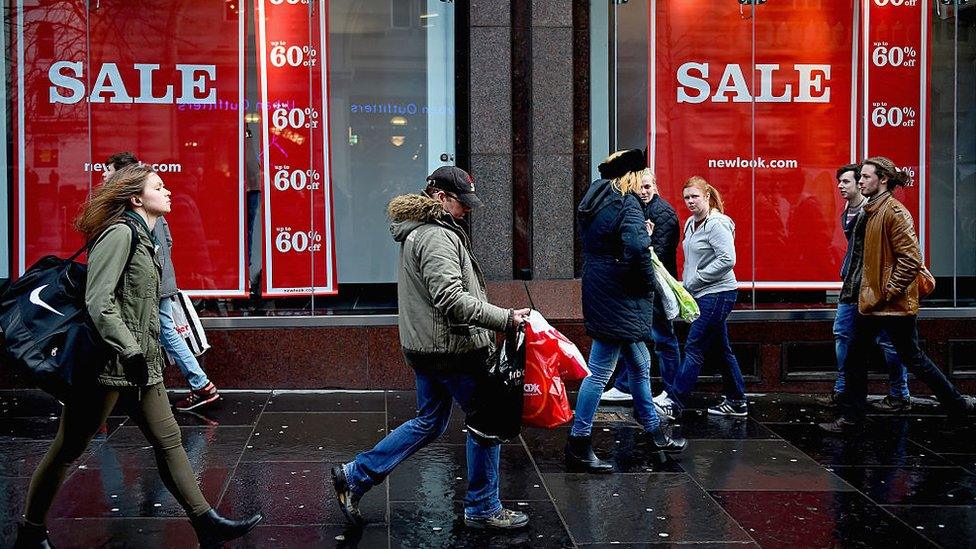 Sale signs on Buchanan Street Glasgow