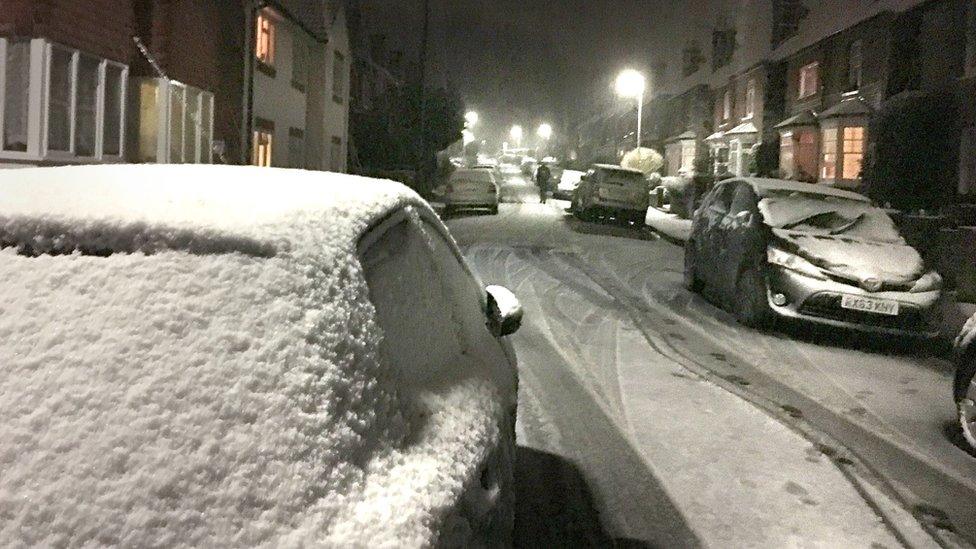 A snowy street in Goldaming, Surrey