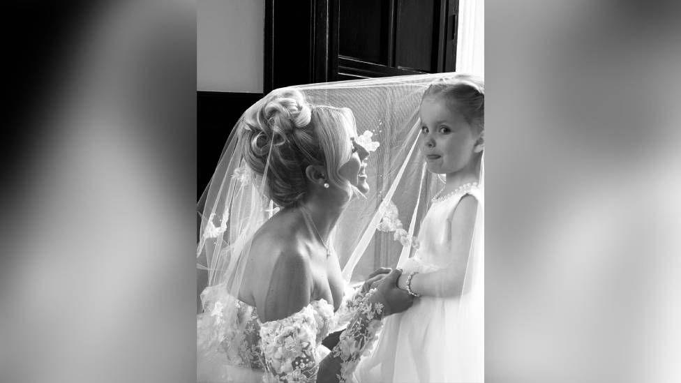 Sophie on her wedding day with her daughter