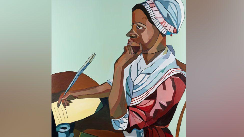 Joy Labinjo's portrait of Phillis Wheatley. She is wearing late 18th Century dress, a white cap on her head and a white kerchief scarf around her shoulders over a pink dress. She is sitting at a table with a quill in her right hand poised above paper. Her left hand is at her chin as she looks into the distance.