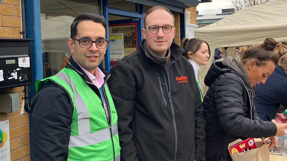 Petr with volunteers at the breakfast club