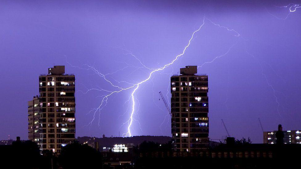 lighting storm over city.