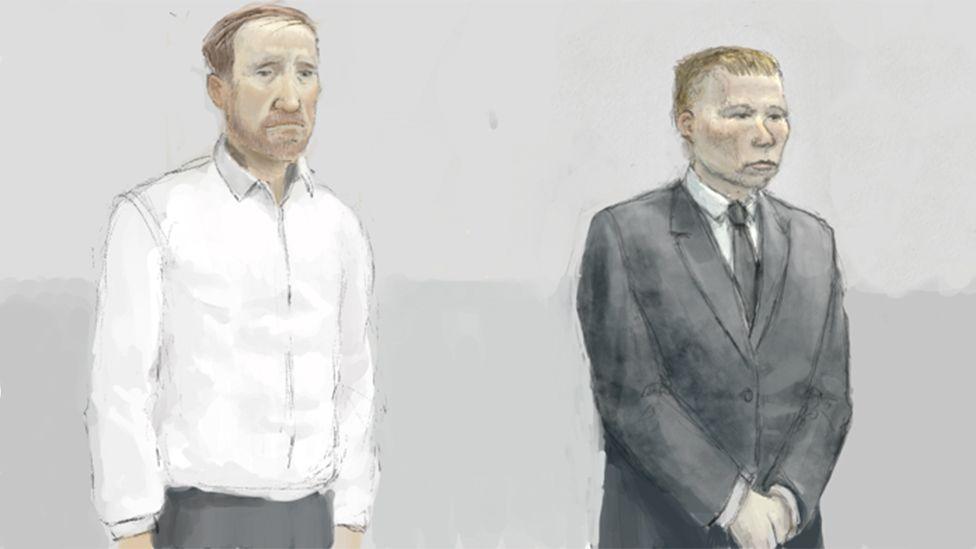 An image by a court illustrator shows Adam Carruthers who has ginger hair and a beard wearing a white shirt and grey trousers standing with his hands by his side. Daniel Graham is beside him in a grey suit and tie with his hands clasped. He is clean shaven with short hair. Both men are shown looking very serious.