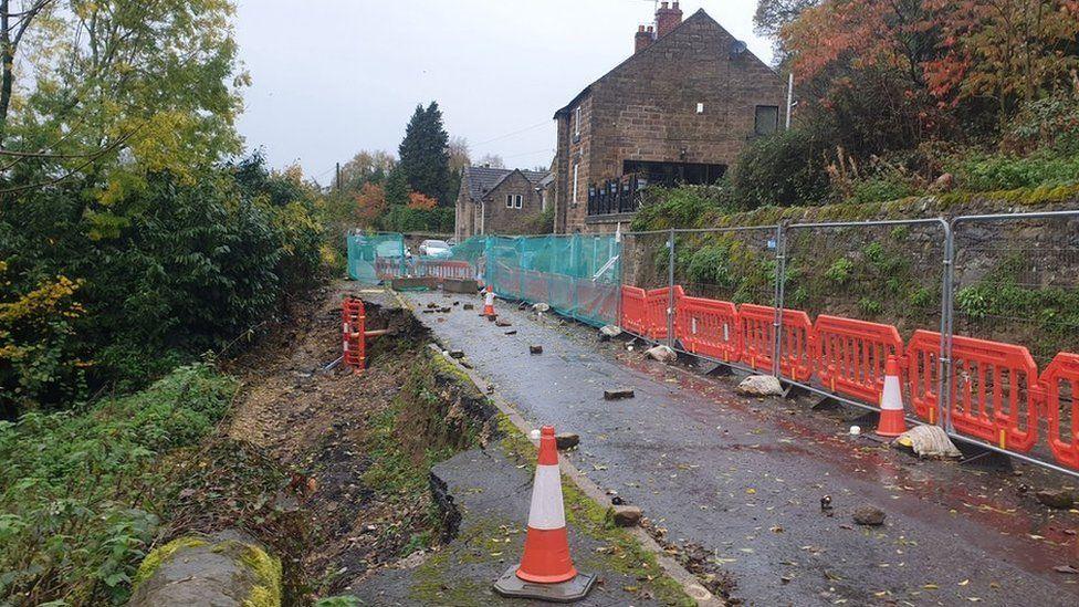 Outdoor image of a road closure due to a landslip

