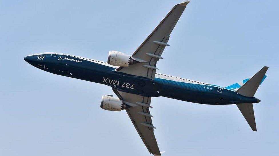 A Boeing 737 Max 9 jet airliner performs its flight display at Le Bourget on June 20, 2017