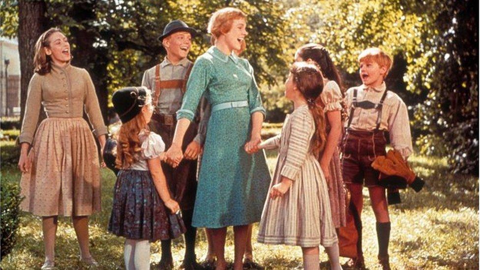 Julie Andrews with actors playing the von Trapp children in The Sound of Music