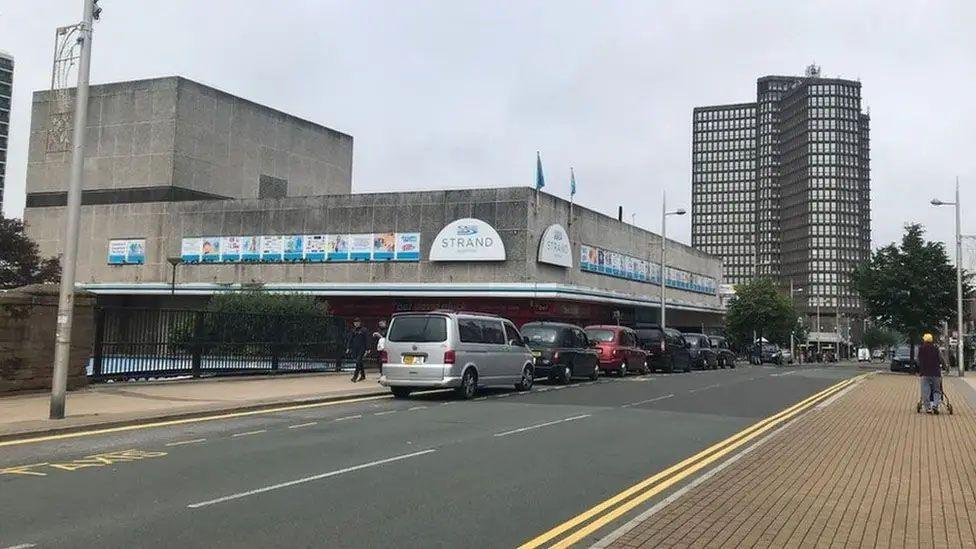 A grey concrete shopping centre
