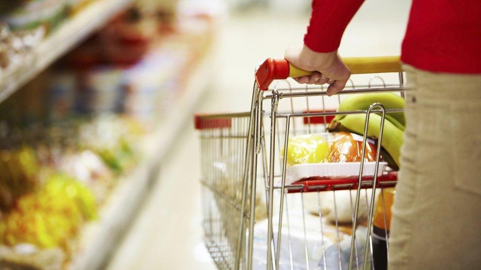 Woman pushing a trolley