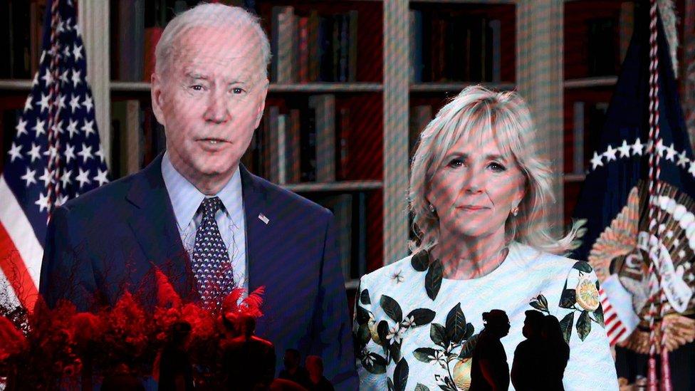 US President Joe Biden and First Lady Jill Biden speak in a video message