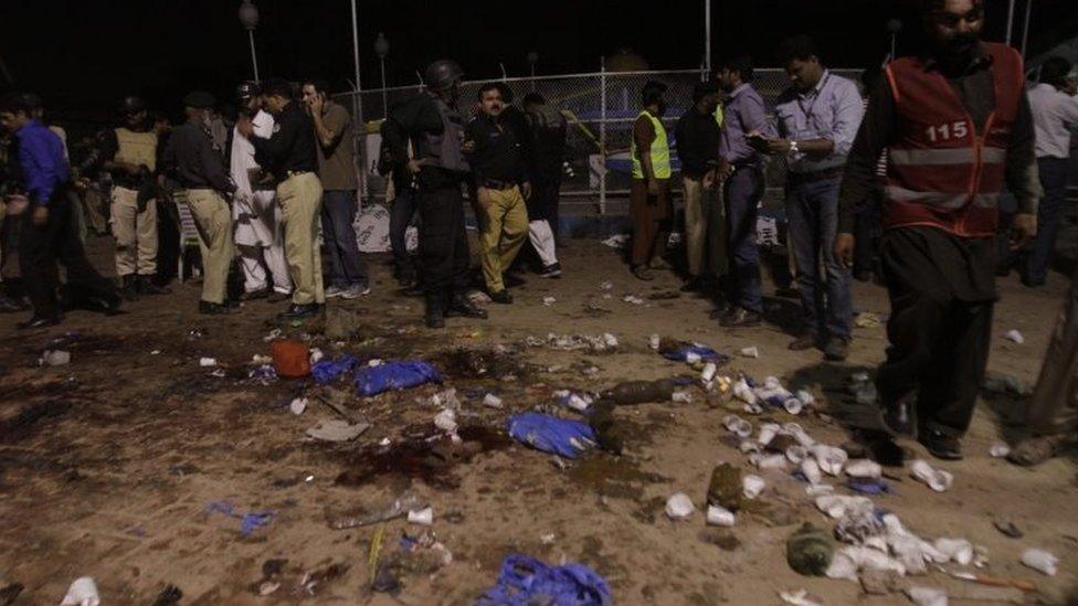 Officials inspect the scene of the attack in Lahore