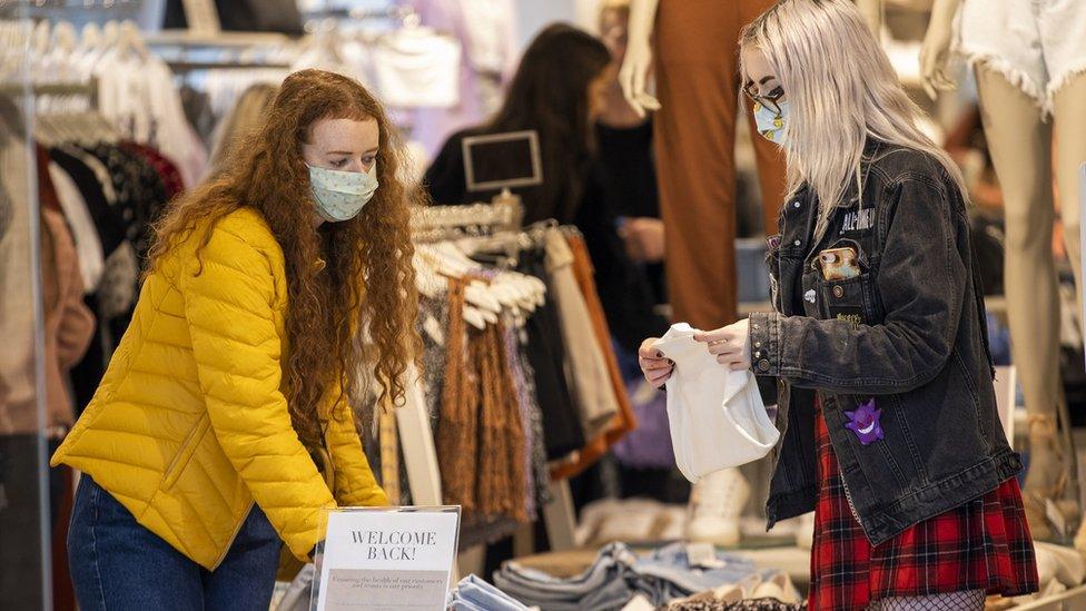 Shoppers wearing facemasks