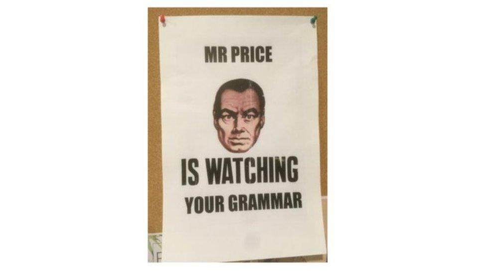 A poster saying "Mr Price is watching you"