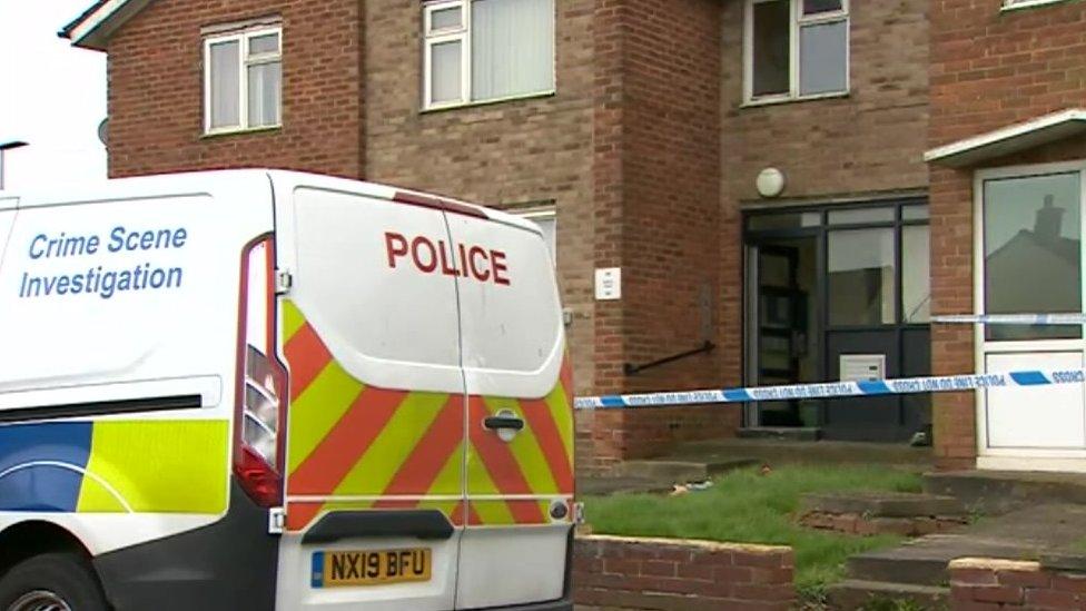 Police van and cordon outside a property on Ketton Road